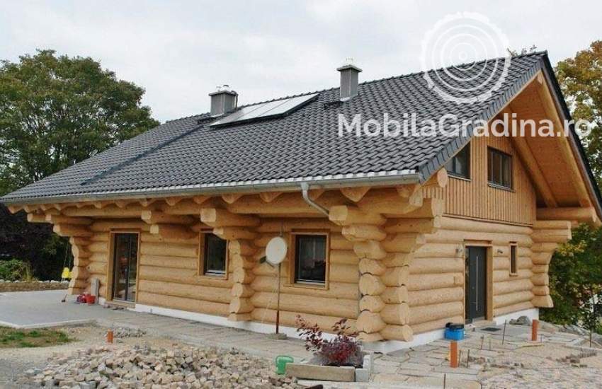 Case din lemn masiv rotund